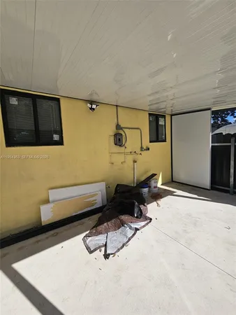 a view of balcony with wooden floor