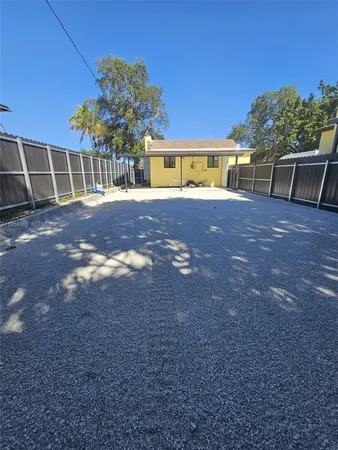 a view of outdoor space yard and swimming pool