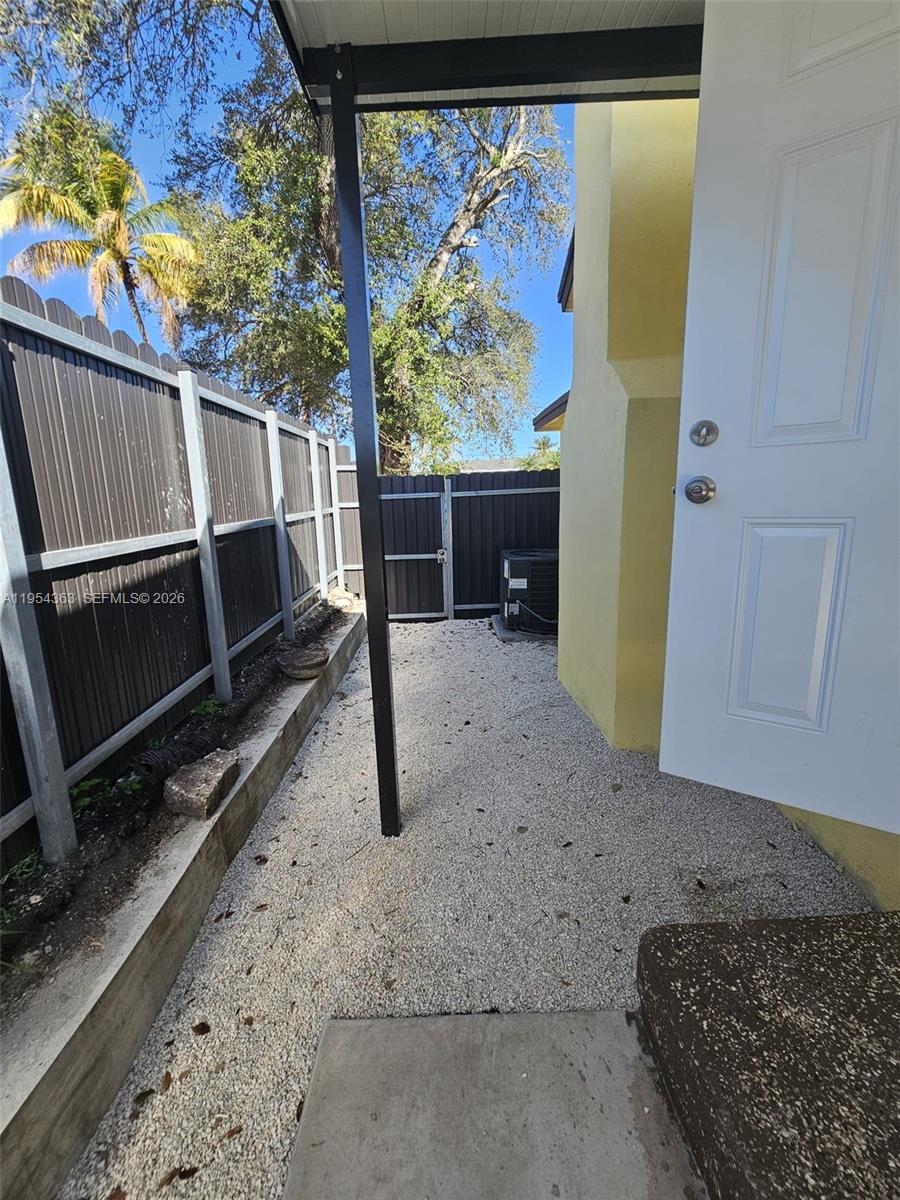1148 Northwest 100th Street, Unit 1 Miami, FL 33150 - Photo 30 of 32 a view of a backyard