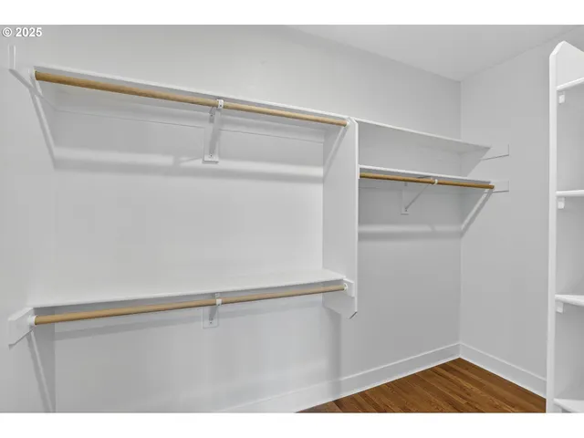 a view of an empty walk in closet