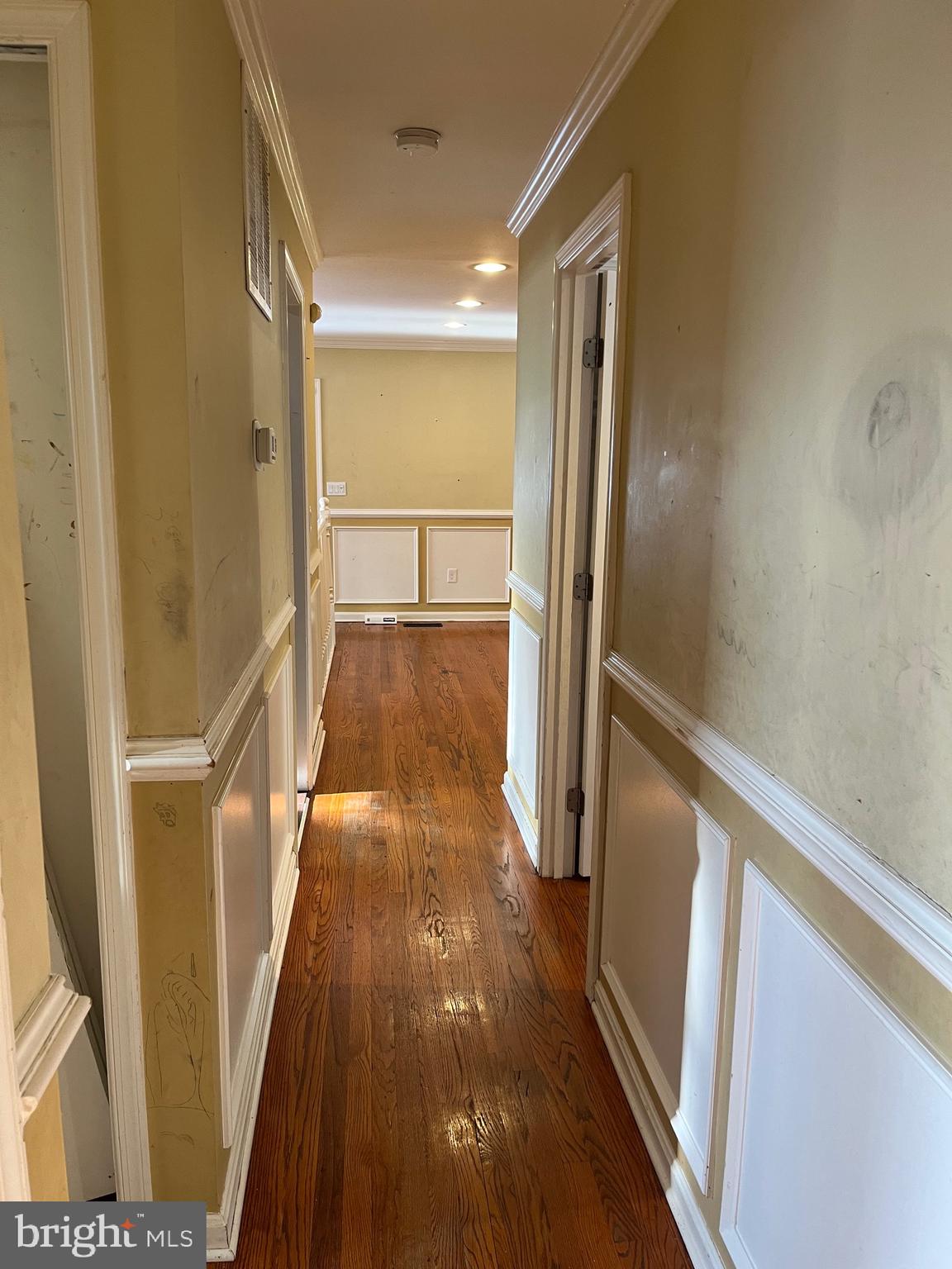 8829 Sigrid Road Randallstown, MD 21133 - Photo 14 of 23 a view of hallway with wooden floor
