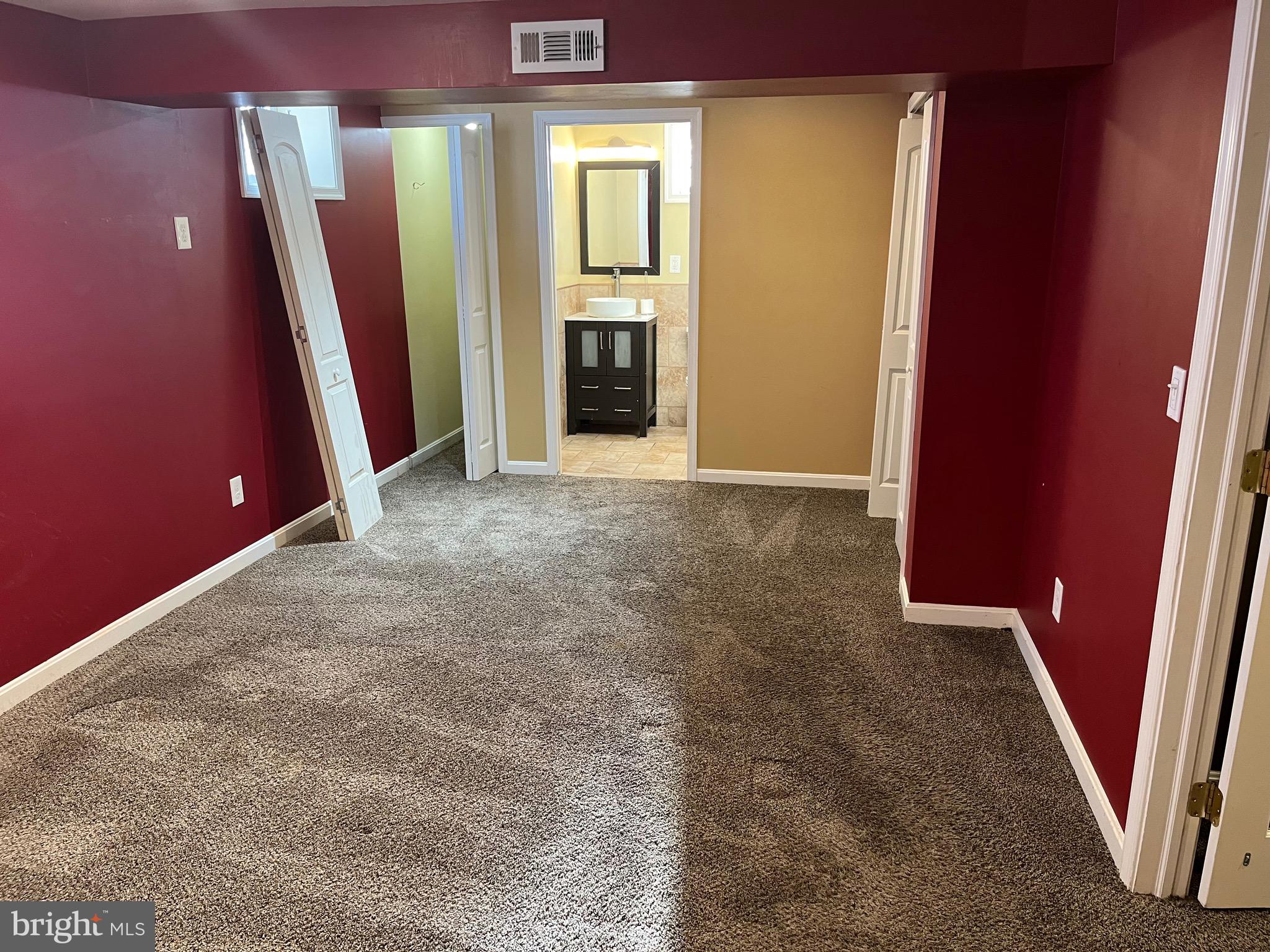 8829 Sigrid Road Randallstown, MD 21133 - Photo 20 of 23 a view of a hallway with furniture