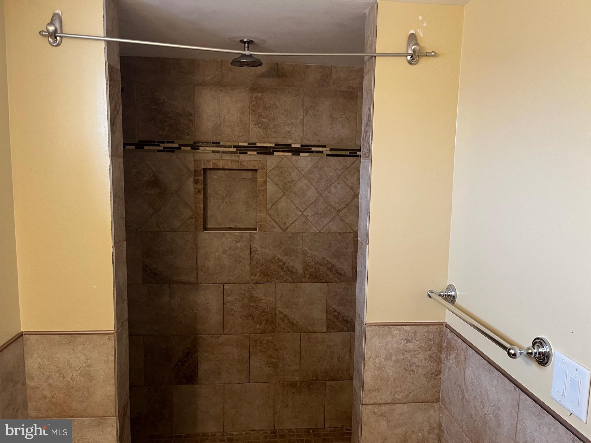 8829 Sigrid Road Randallstown, MD 21133 - Photo 27 of 28 a bathroom with a shower