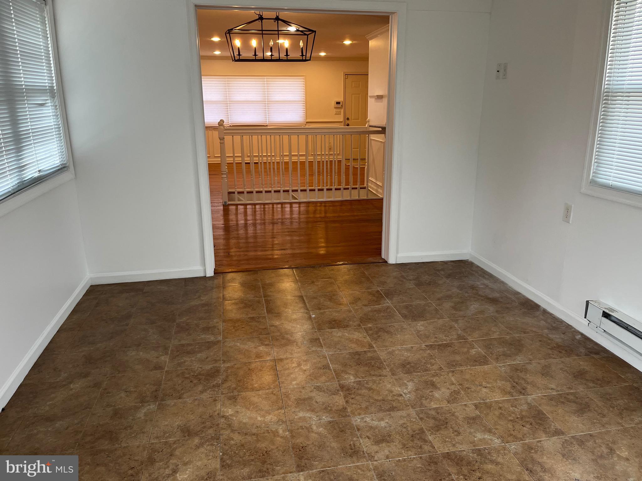 8829 Sigrid Road Randallstown, MD 21133 - Photo 10 of 28 an empty room with windows