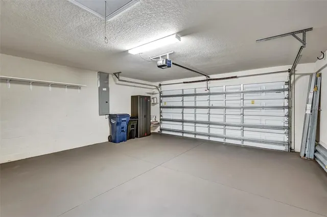 a view of empty room with white walls