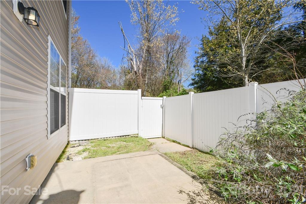 1903 Travertine Lane Fort Mill, SC 29708 - Photo 2 of 20 a view of a backyard