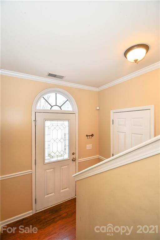 1903 Travertine Lane Fort Mill, SC 29708 - Photo 11 of 20 a view of front door with wooden floor