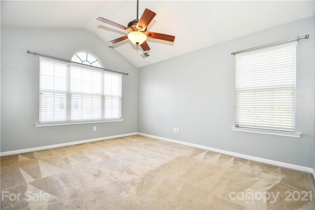 1903 Travertine Lane Fort Mill, SC 29708 - Photo 14 of 20 a view of an empty room with a window