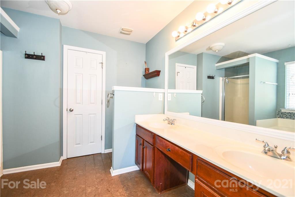 1903 Travertine Lane Fort Mill, SC 29708 - Photo 15 of 20 a room with a sink and a mirror