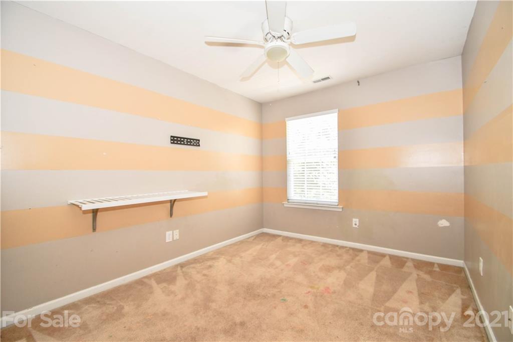 1903 Travertine Lane Fort Mill, SC 29708 - Photo 19 of 20 a view of an empty room with a window
