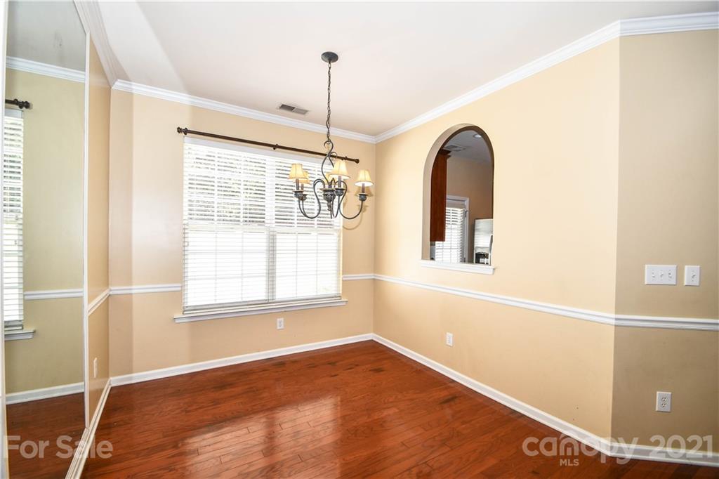 1903 Travertine Lane Fort Mill, SC 29708 - Photo 5 of 20 a view of an empty room with a window