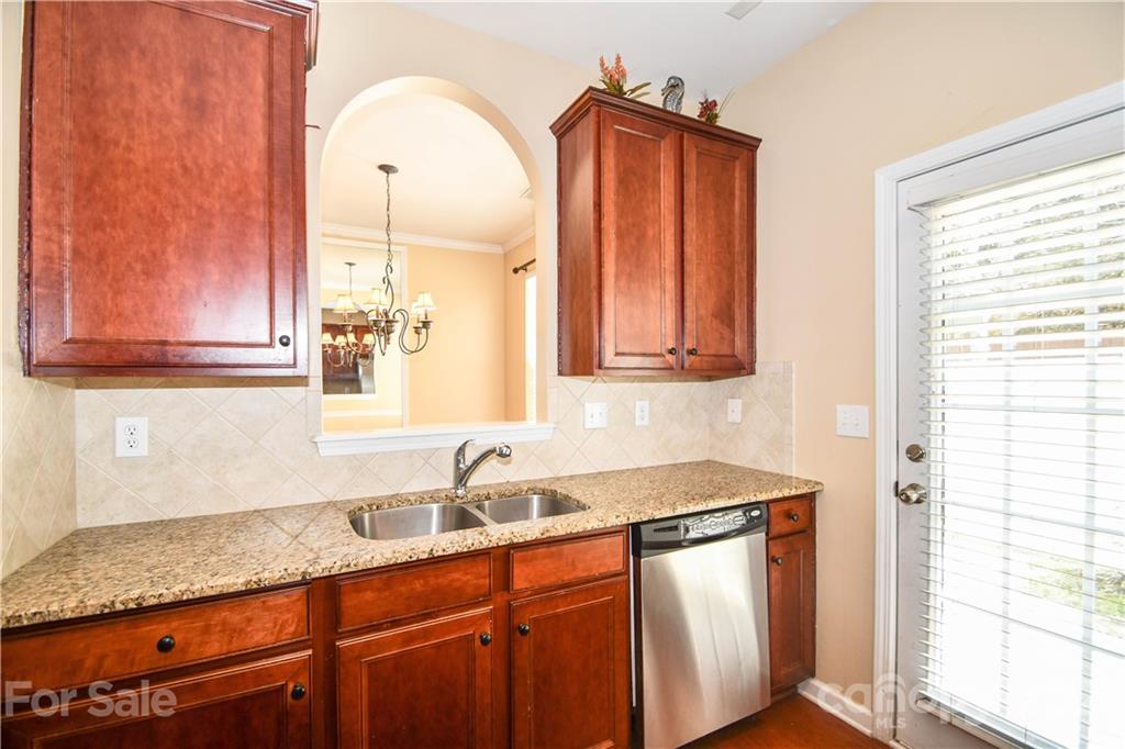 1903 Travertine Lane Fort Mill, SC 29708 - Photo 9 of 20 a bathroom with a sink and a mirror
