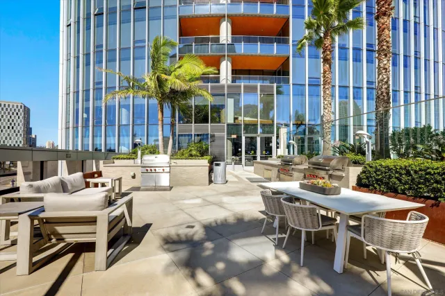 a spacious bathroom with a double vanity sink a mirror and a shower