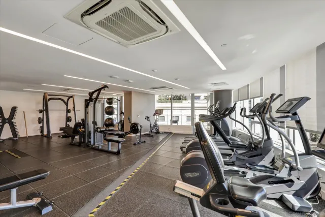 a view of living room with furniture and fireplace