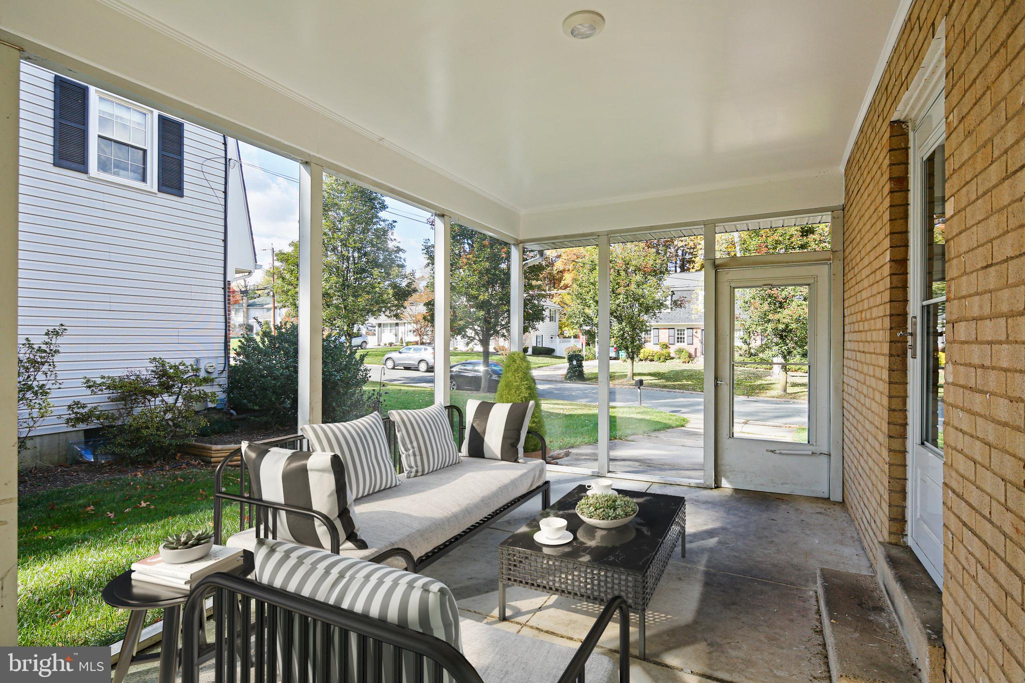 6109 Goodman Road Laurel, MD 20707 - Photo 4 of 36 Screened in porch - virtually staged