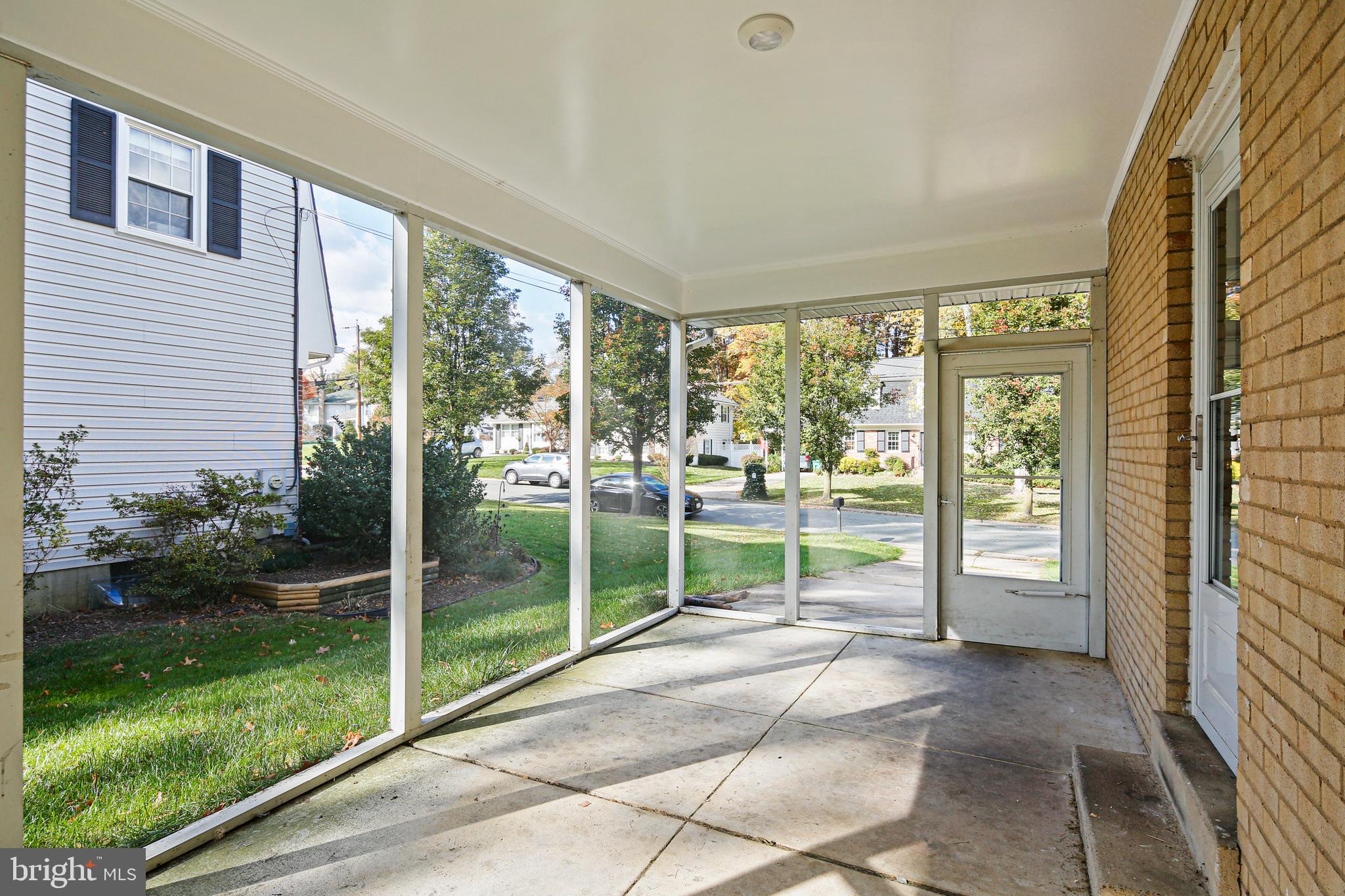 6109 Goodman Road Laurel, MD 20707 - Photo 5 of 36 Screened in porch