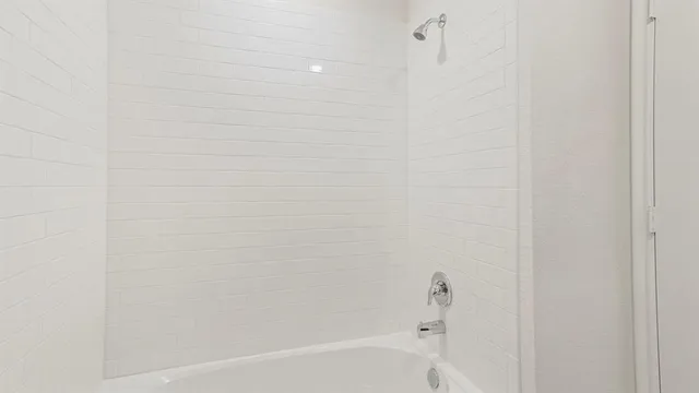 a close up of a bathtub