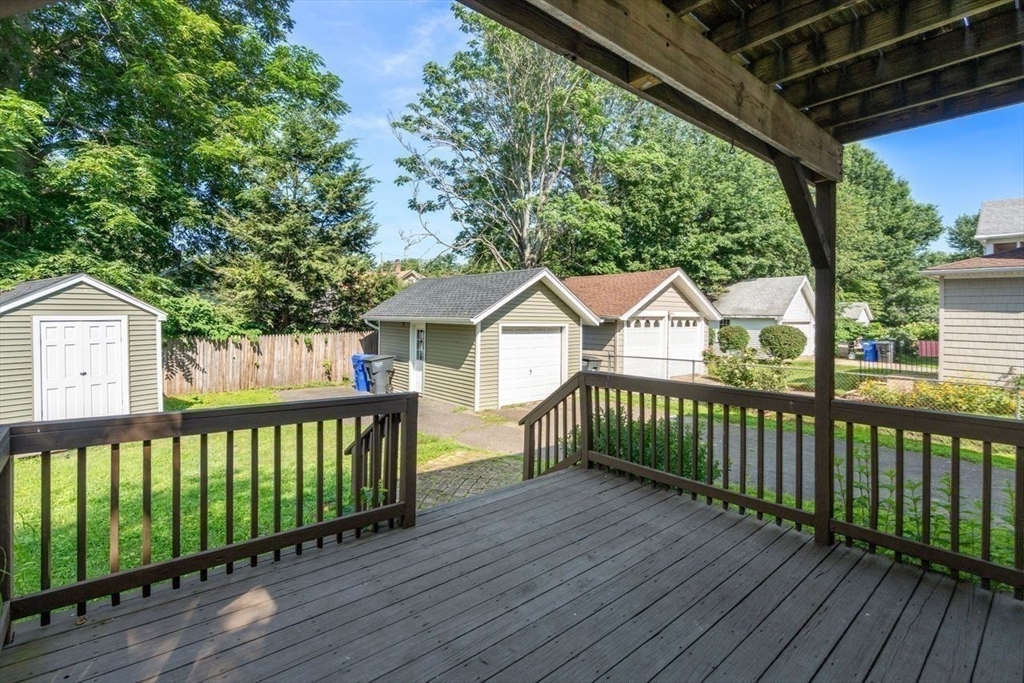 38 Manchester Terrace Springfield, MA 01108 - Photo 13 of 15 a view of a wooden deck and a yard
