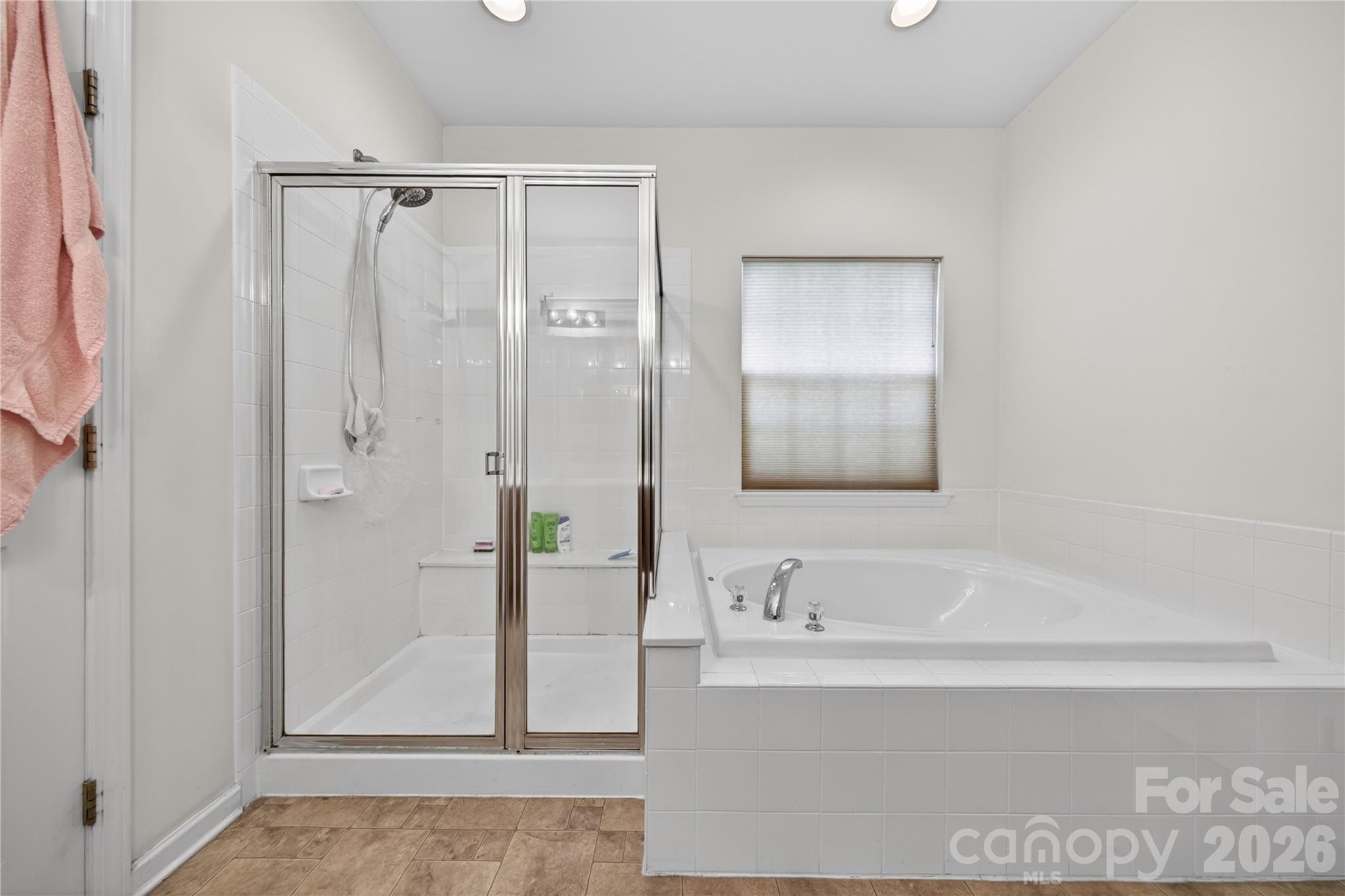 533 Fair Oaks Drive Fort Mill, SC 29708 - Photo 21 of 33 a bathroom with a bathtub and a shower