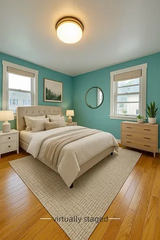 a bedroom with a bed and window