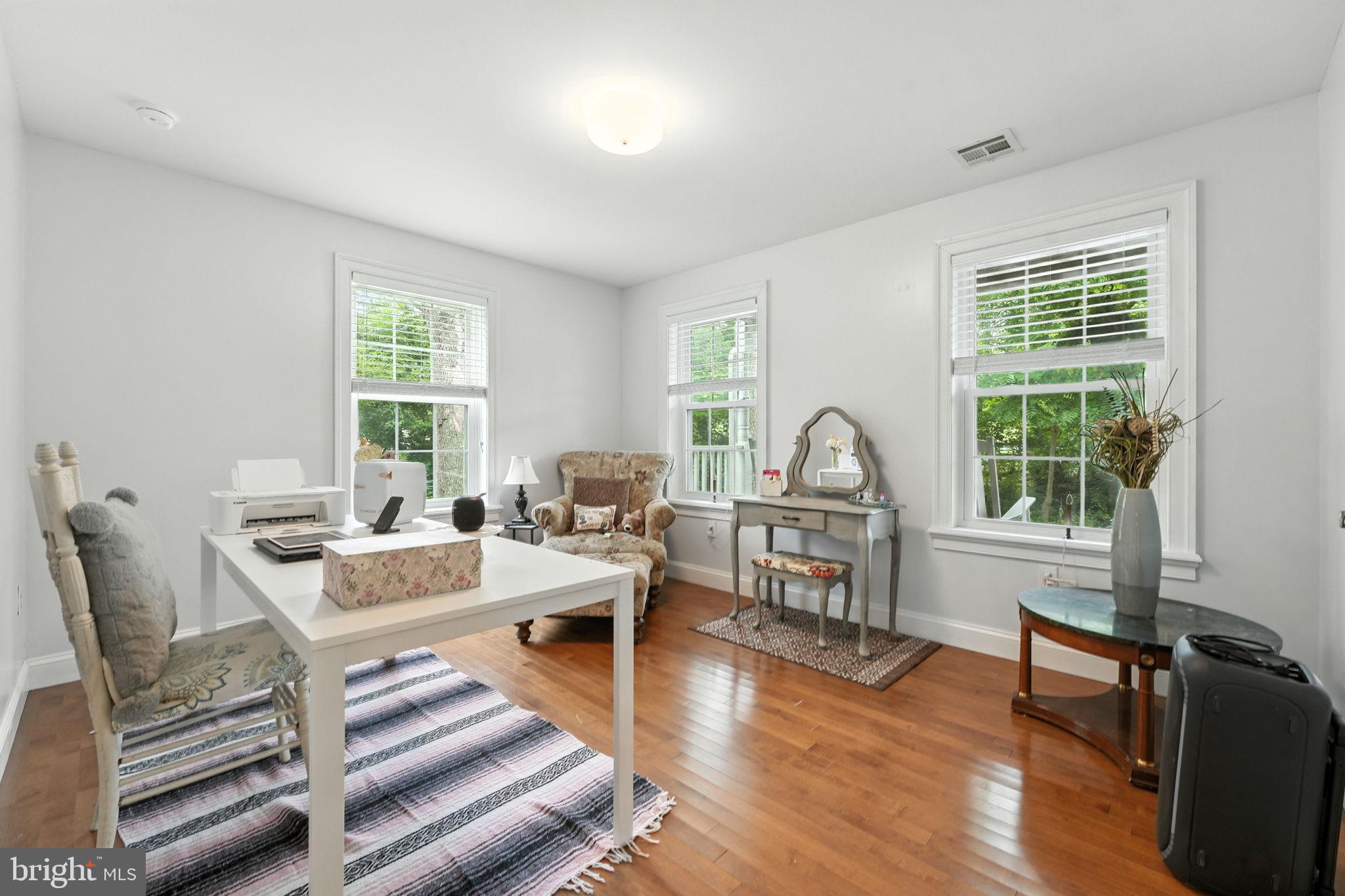 609 Creek Road Kennett Square, PA 19348 - Photo 13 of 39 a living room with furniture and a window