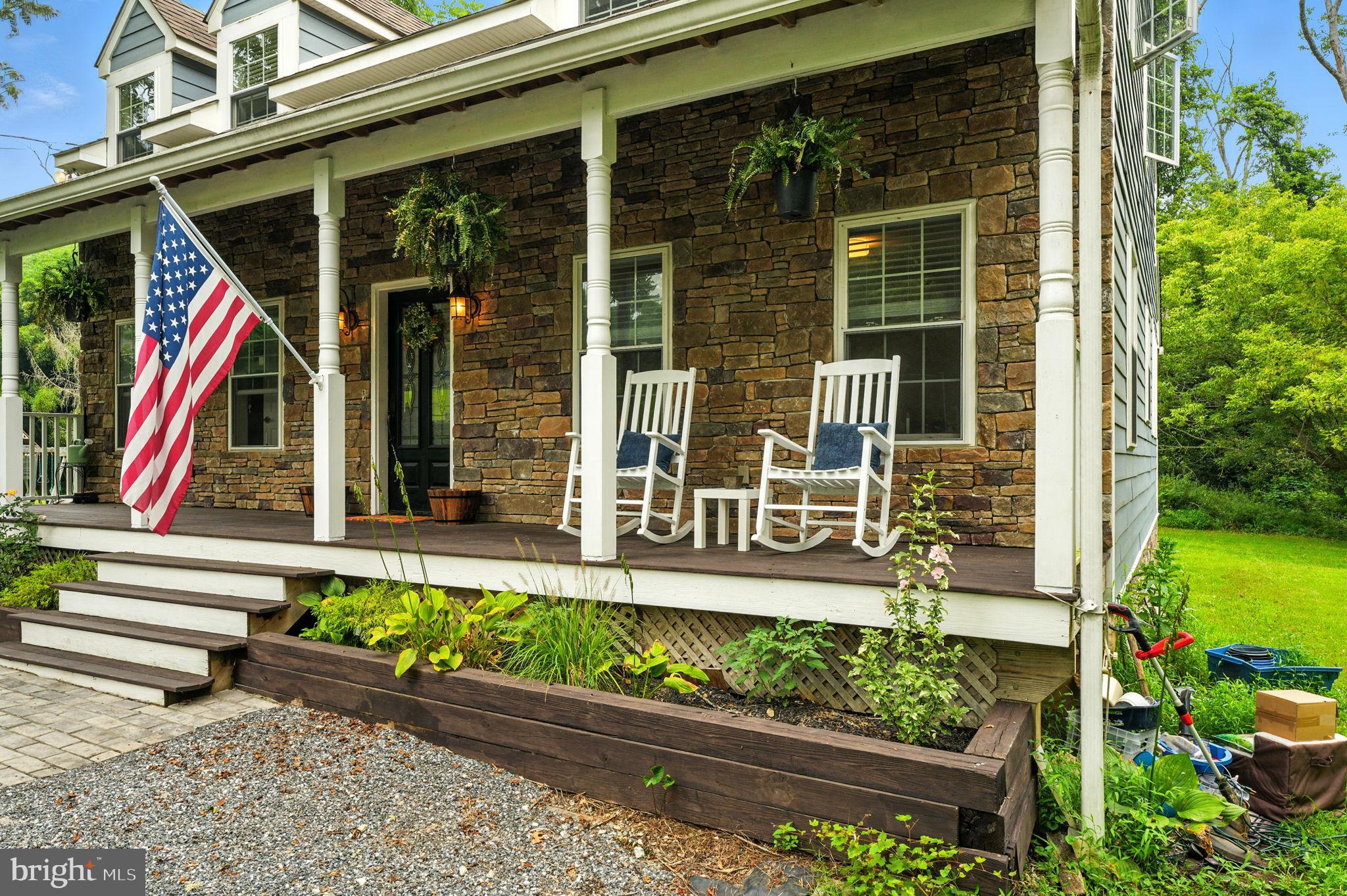 609 Creek Road Kennett Square, PA 19348 - Photo 2 of 39 front view of a house with a yard