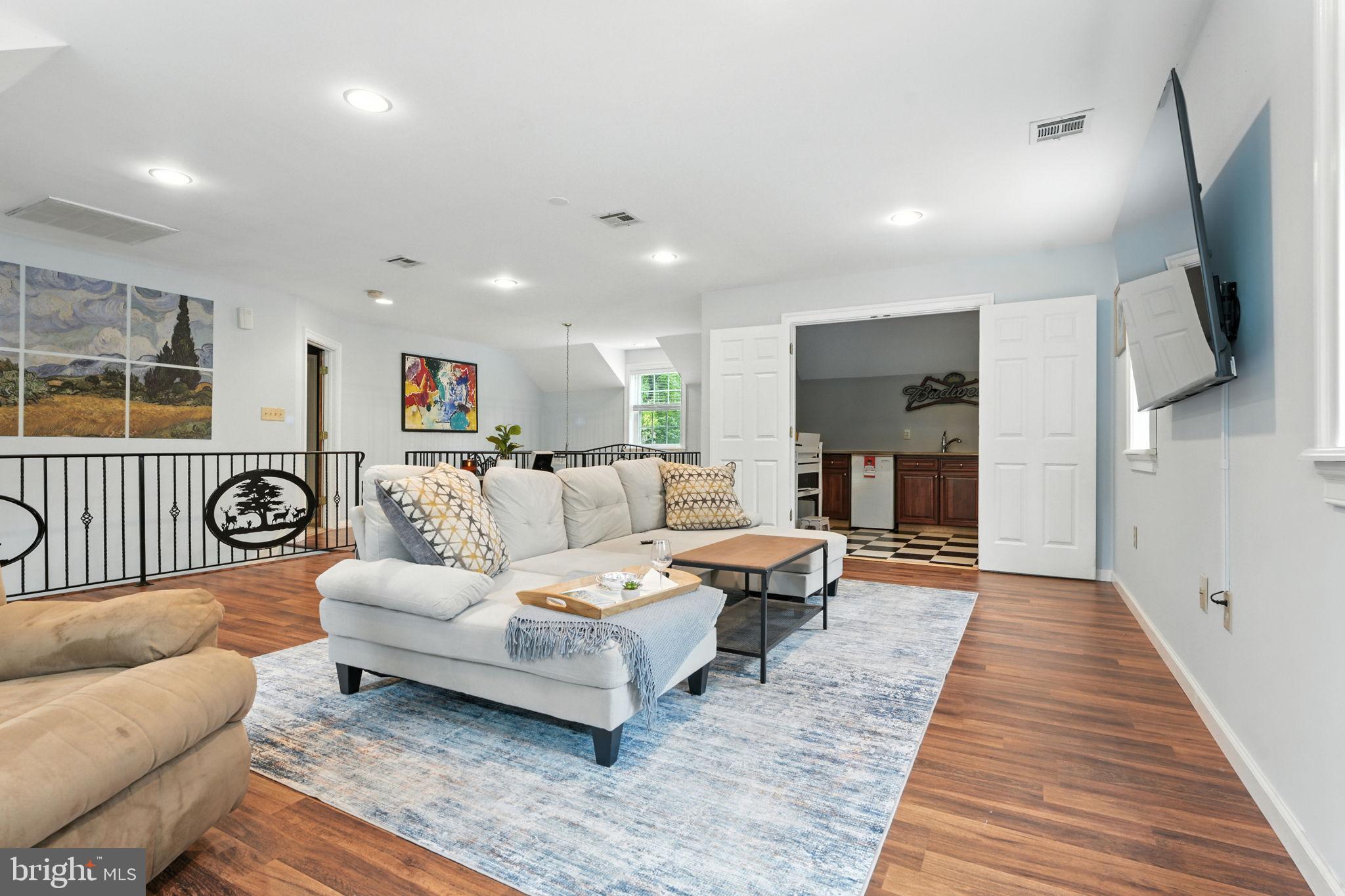 609 Creek Road Kennett Square, PA 19348 - Photo 21 of 39 a living room with furniture and a rug