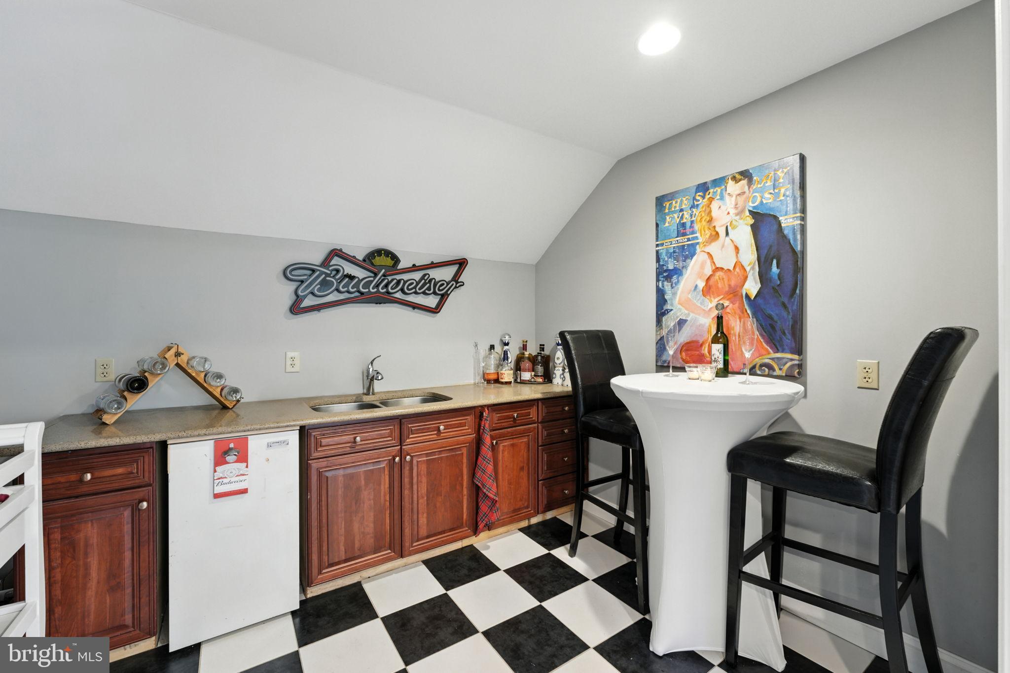 609 Creek Road Kennett Square, PA 19348 - Photo 22 of 39 a view of a kitchen with stainless steel appliances granite countertop a sink and a cabinets
