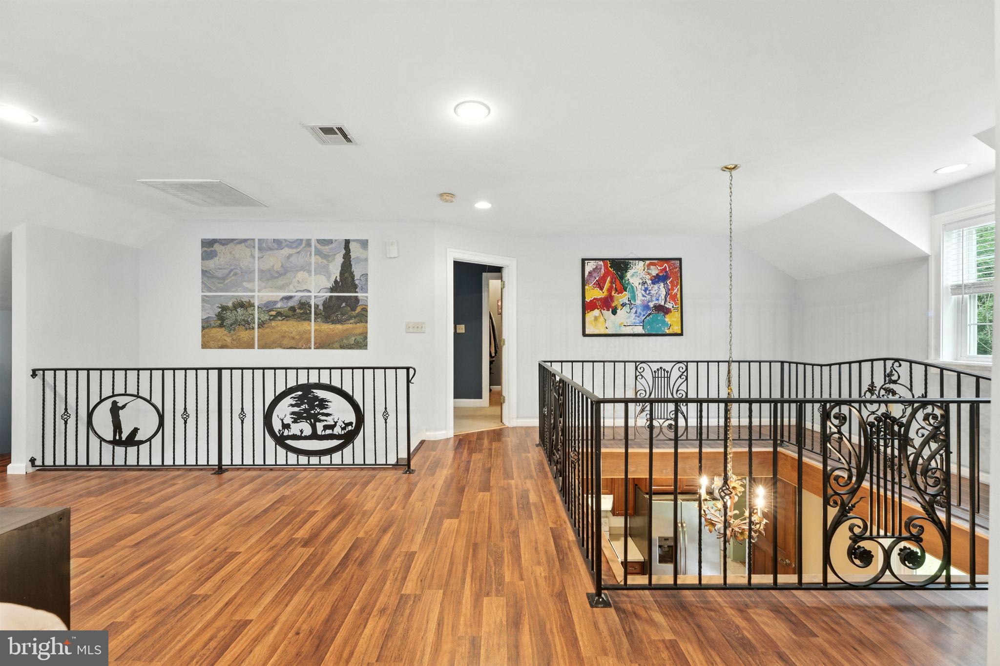 609 Creek Road Kennett Square, PA 19348 - Photo 23 of 39 a view of a hallway with wooden floor