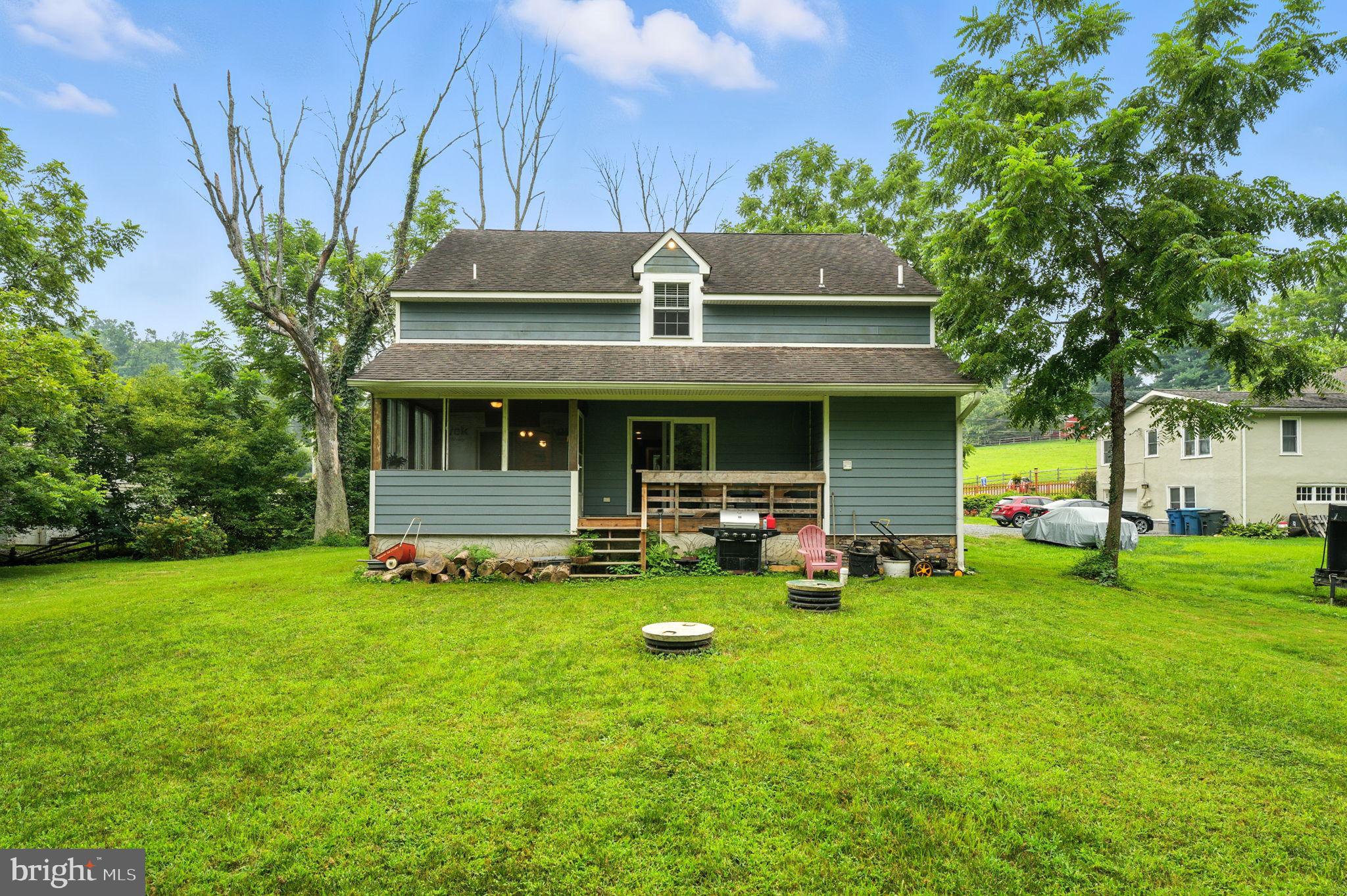 609 Creek Road Kennett Square, PA 19348 - Photo 34 of 39 a view of an house with backyard space and porch