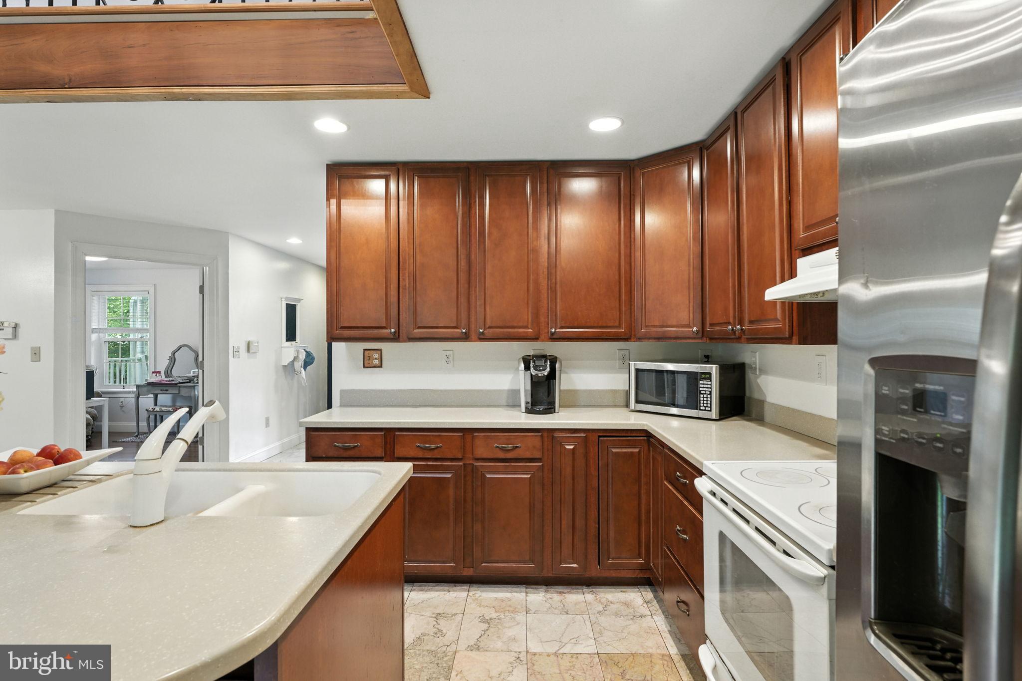 609 Creek Road Kennett Square, PA 19348 - Photo 7 of 39 a kitchen with a sink cabinets and window