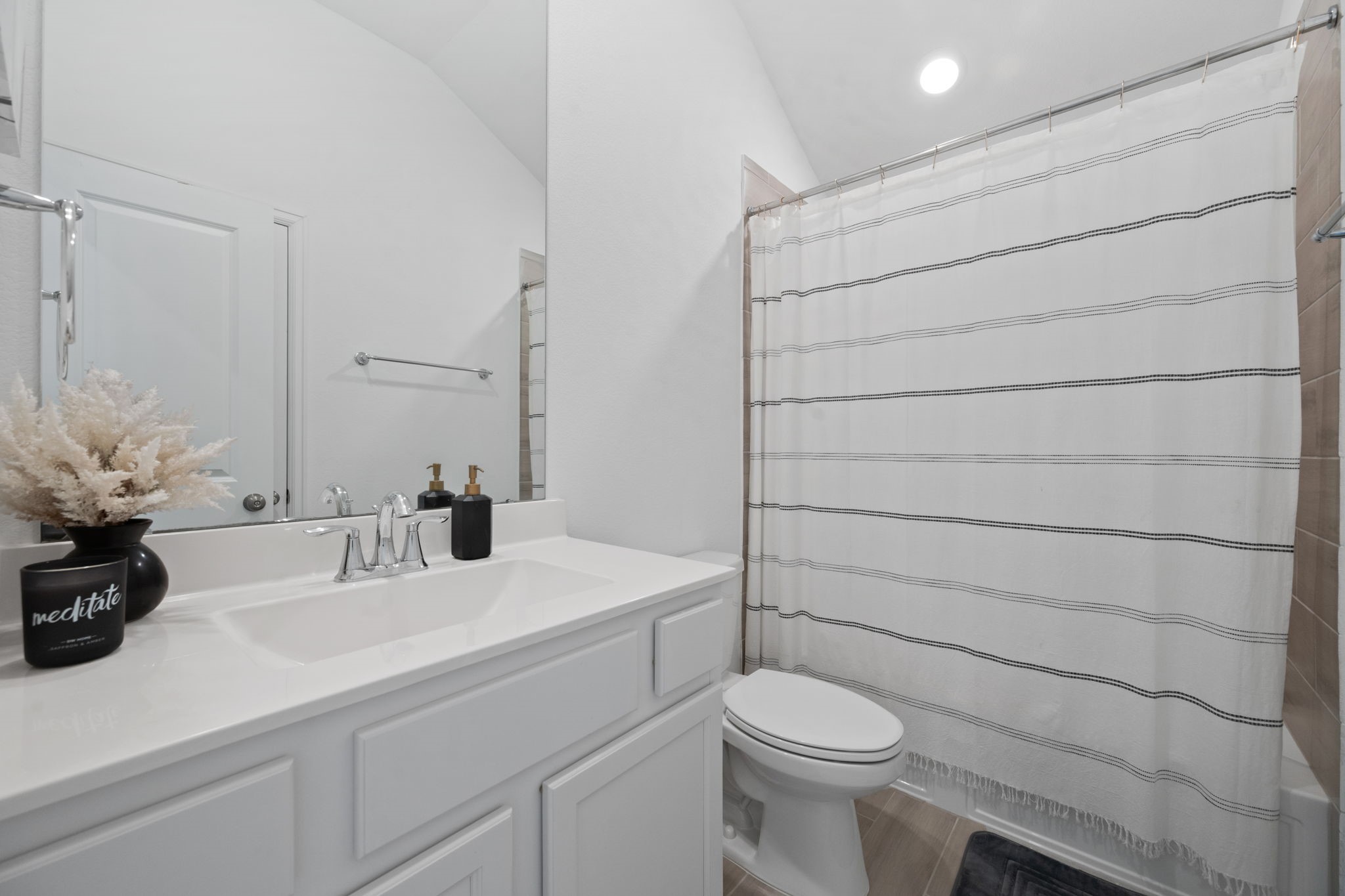 4218 Redford Valley Road Rosharon, TX 77583 - Photo 19 of 36 a bathroom with a sink a toilet and mirror