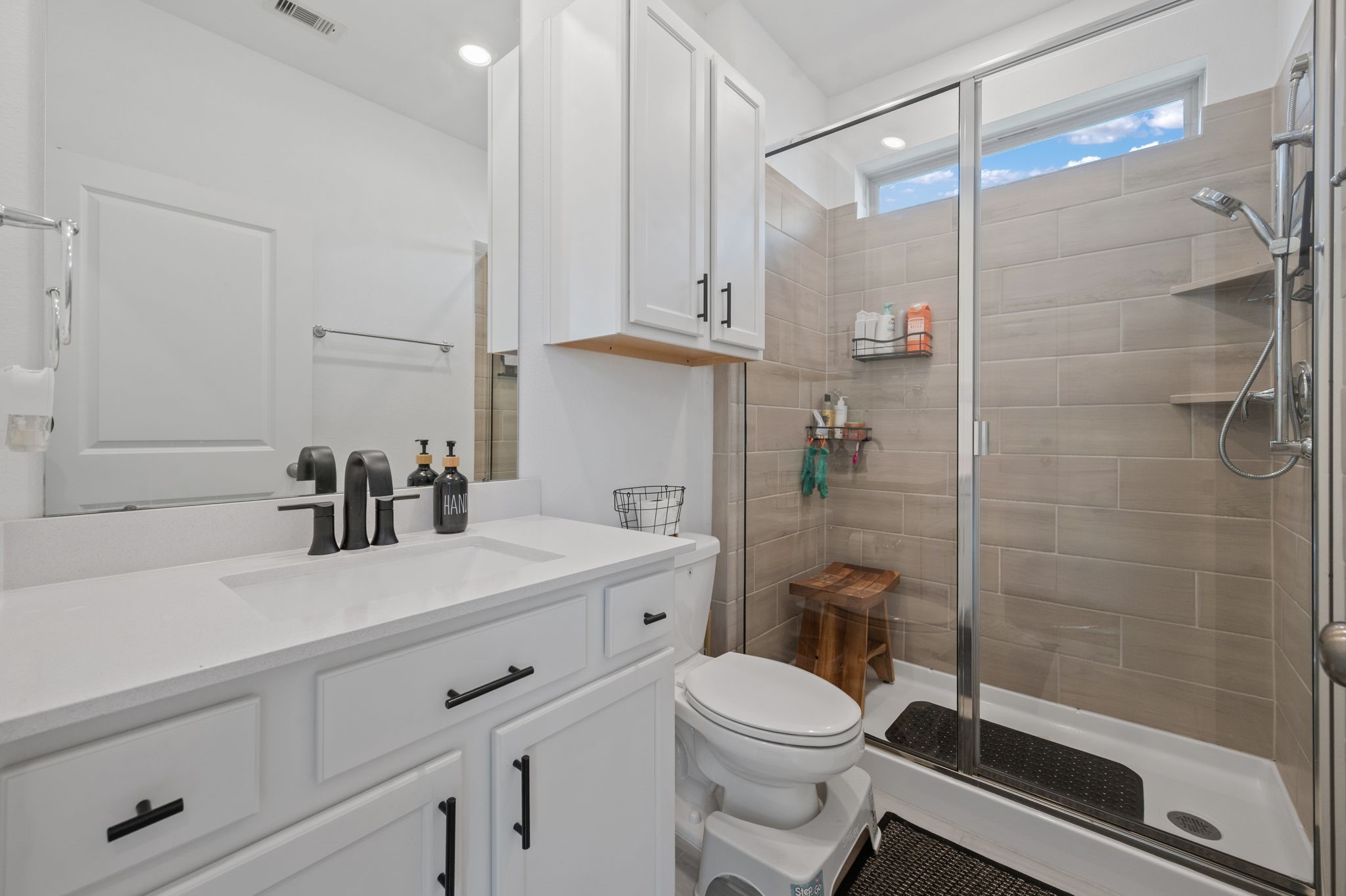 4218 Redford Valley Road Rosharon, TX 77583 - Photo 25 of 36 a bathroom with a sink a toilet and shower
