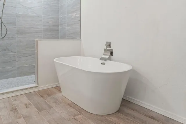 a view of a bathtub in a bathroom