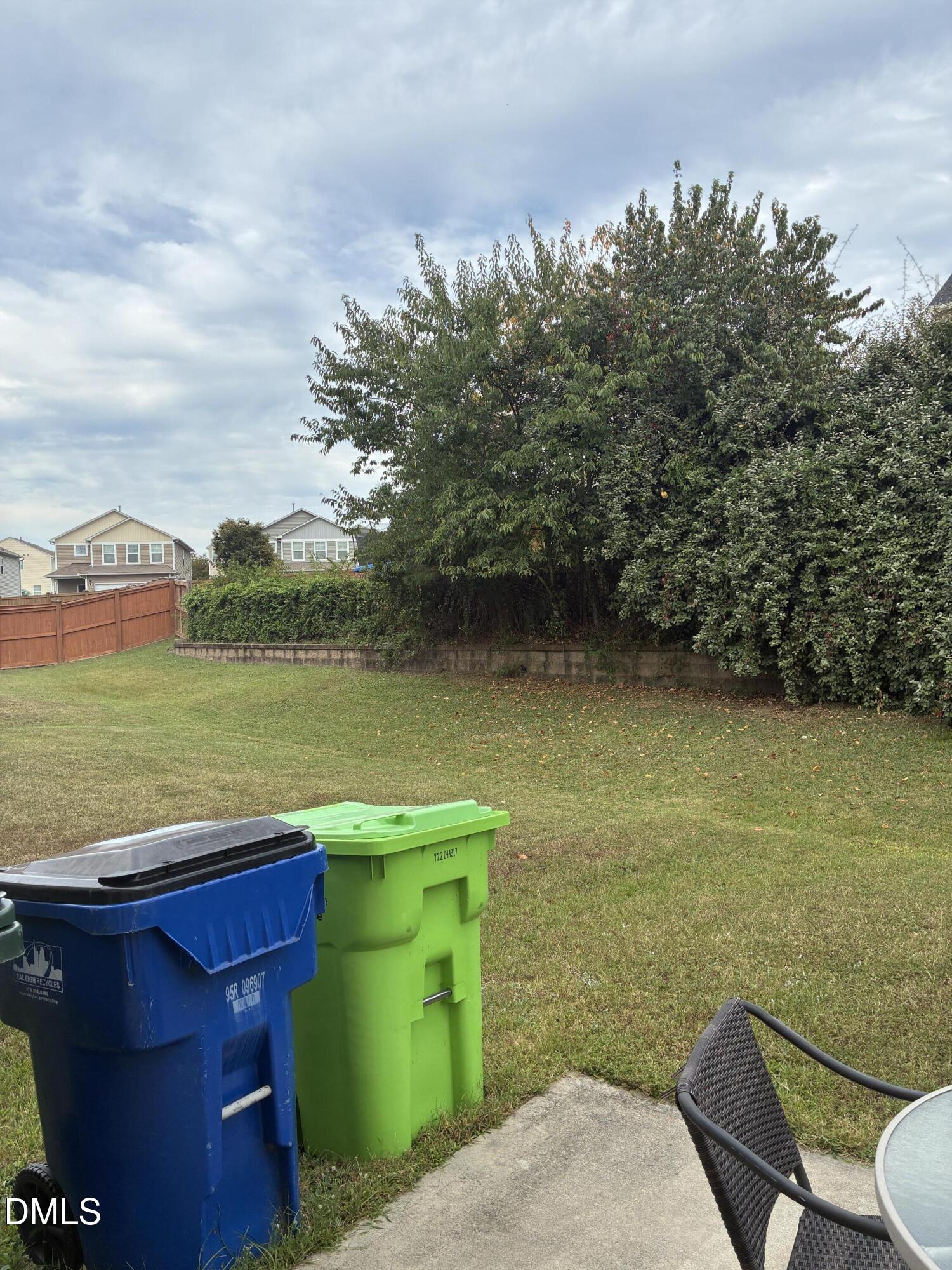 4325 Lyman Avenue Raleigh, NC 27616 - Photo 21 of 52 a terrace with a table and chairs