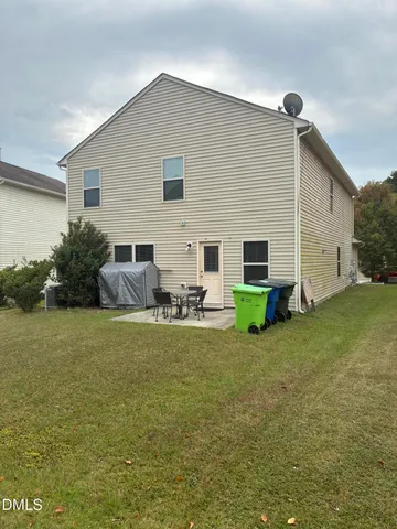 a house view with a outdoor space