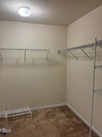 a view of small space with racks on the wall