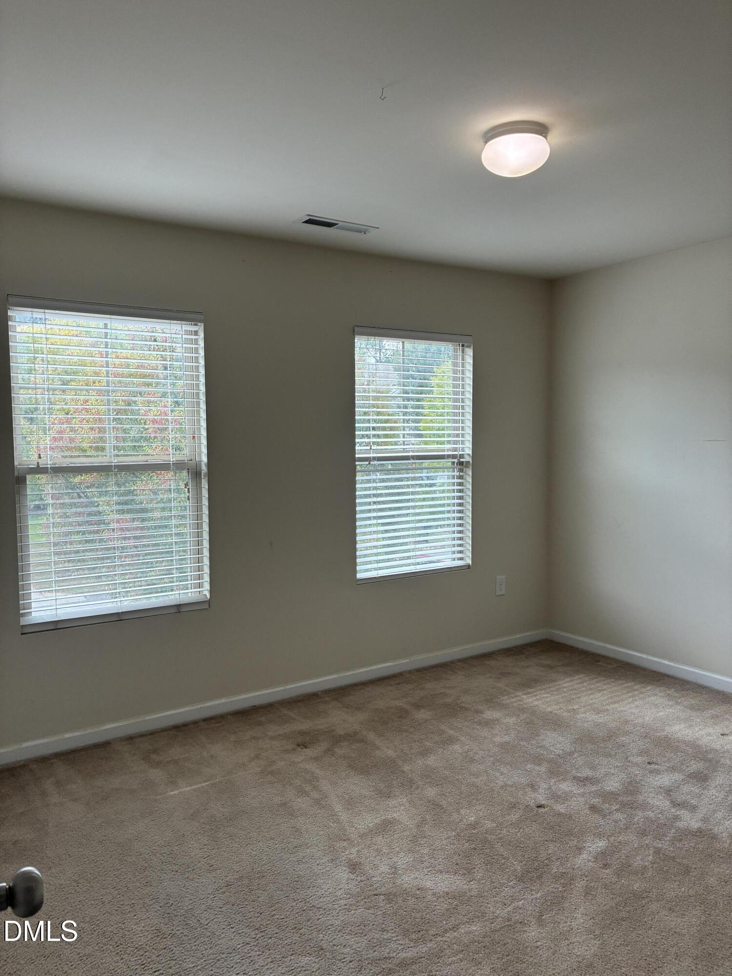 4325 Lyman Avenue Raleigh, NC 27616 - Photo 43 of 52 an empty room with a window
