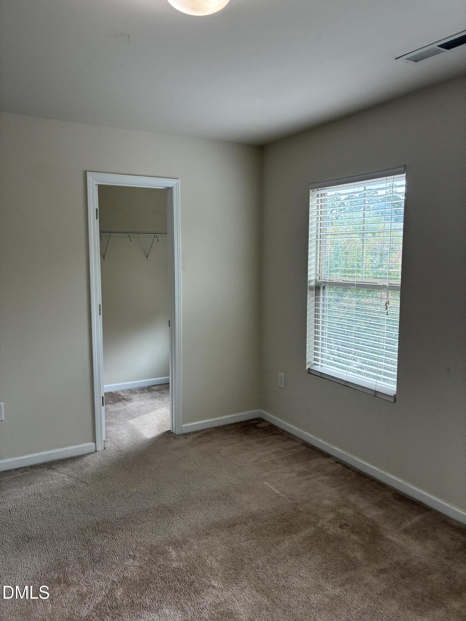 4325 Lyman Avenue Raleigh, NC 27616 - Photo 44 of 52 an empty room with a window