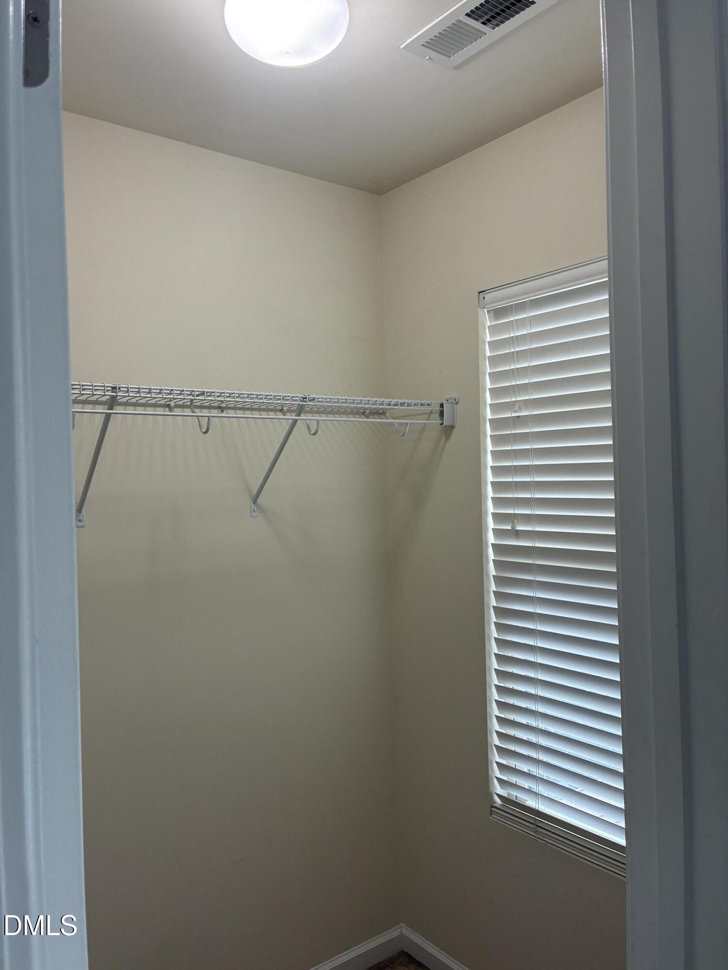 4325 Lyman Avenue Raleigh, NC 27616 - Photo 45 of 52 a view of a room with racks on the wall