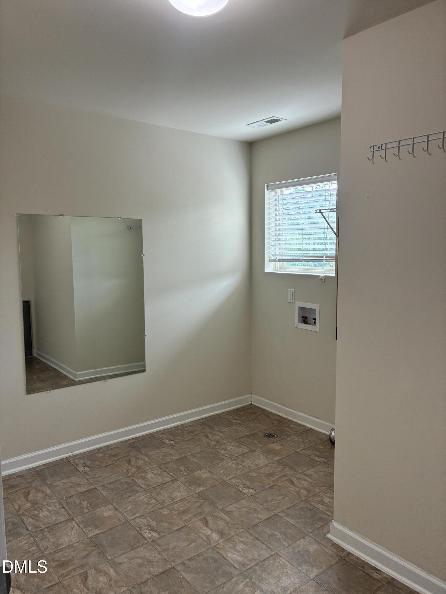 4325 Lyman Avenue Raleigh, NC 27616 - Photo 46 of 52 a view of an empty room with a window