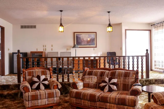 a bedroom with a bed and tv