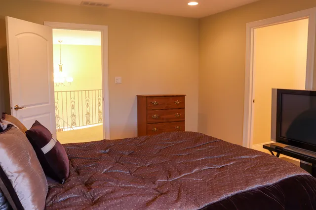 a view of a garage with wooden floor