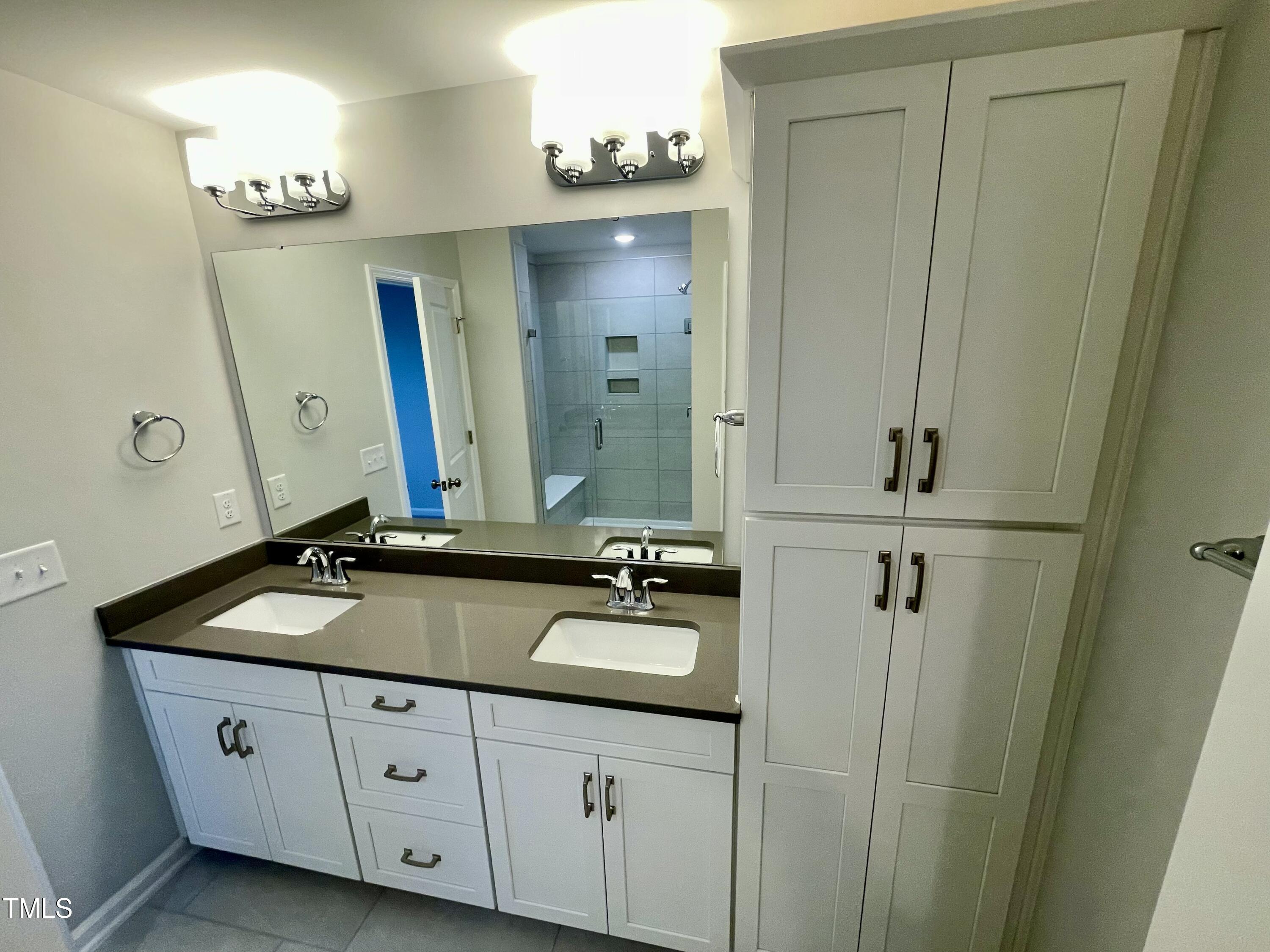 2103 Lambert Road, Unit 62 Cary, NC 27519 - Photo 30 of 77 21. primary bath with drawers and acceso