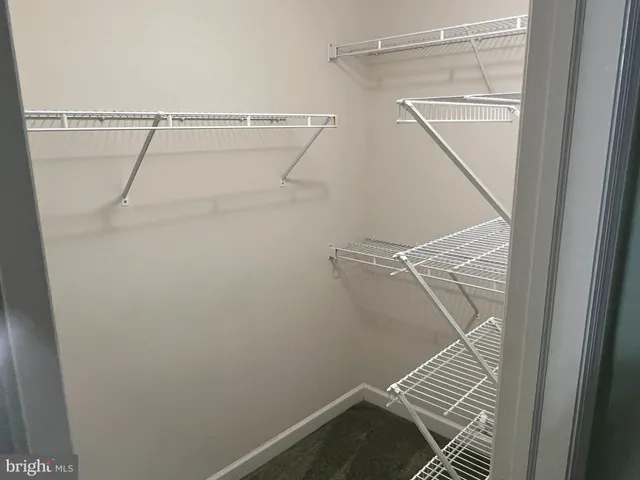 a view of a room with racks on the wall