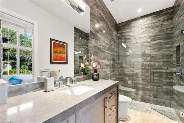 a bed room with a bed and a couch