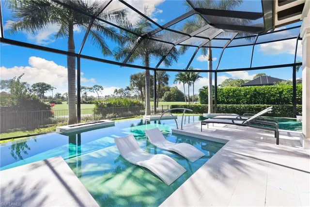 a view of swimming pool with patio