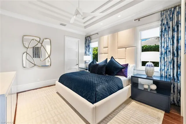 a bathroom with a double vanity sink mirror and shower