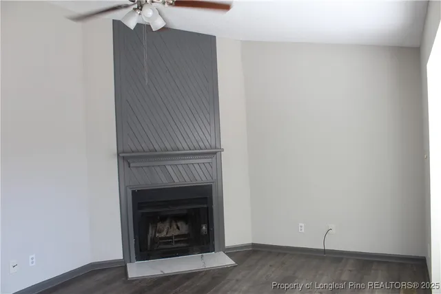 a living room with a fireplace