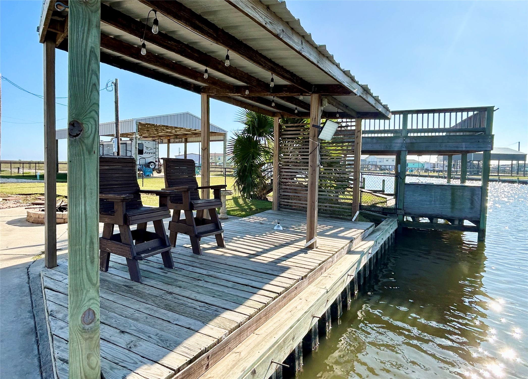 151 Neptune Sargent, TX 77414 - Photo 14 of 26 a view of outdoor space with seating area